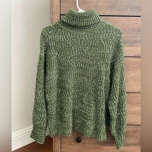 Green knitted sweater